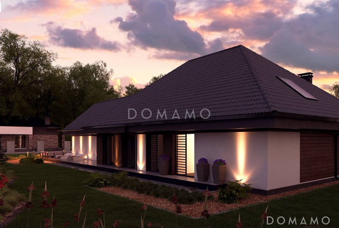 Проект большого одноэтажного дома из газобетона с четырьмя спальнями, гаражом и панорамным остеклением гостиной