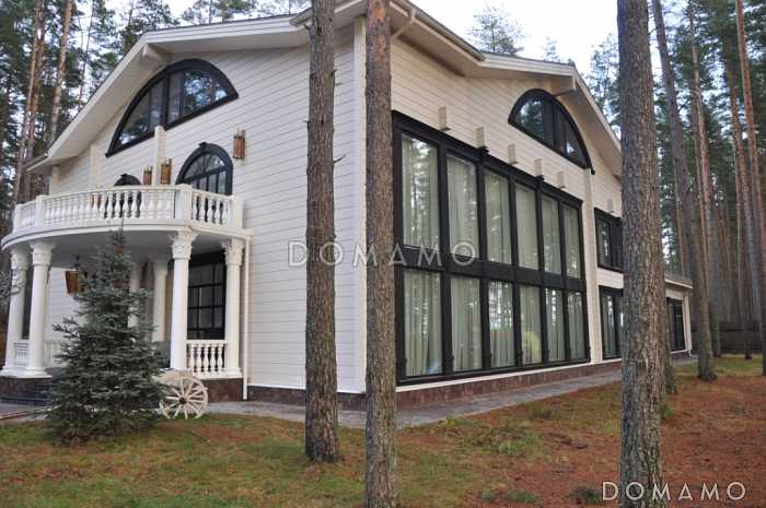 Проект роскошного дома из клееного бруса с бассейном и огромной гостиной