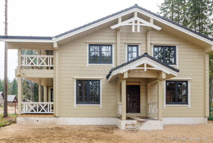 Проект двухэтажного дома из клееного бруса с пятью спальнями