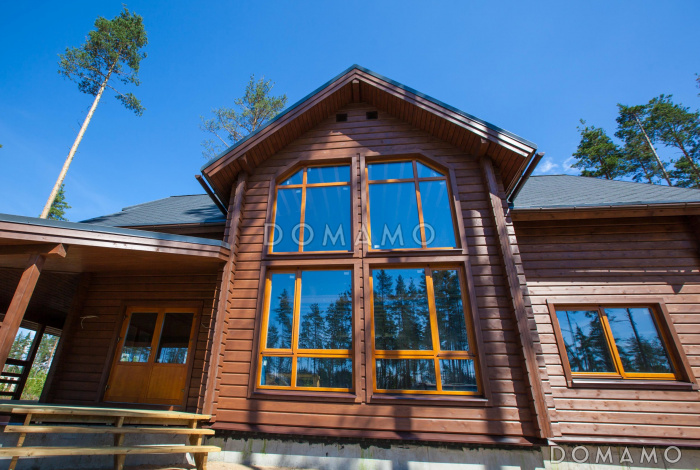 Проект каркасного дома с огромной крытой террасой