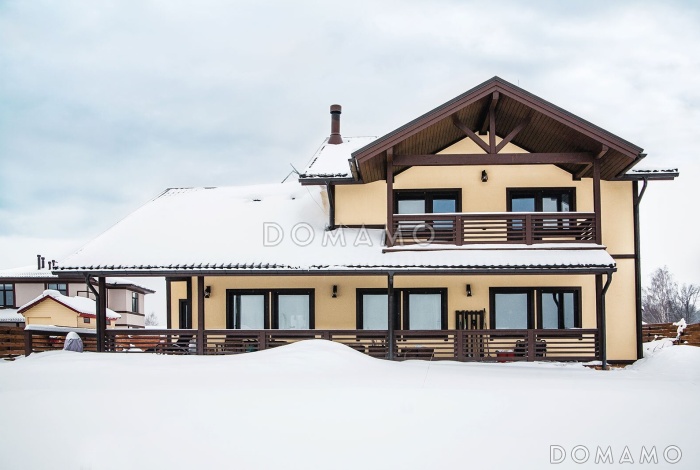 Проект мансардного дома из газобетона с 4 спальнями, кабинетом, сауной и крытой террасой