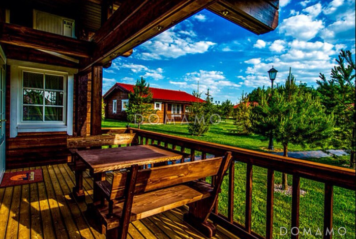 Проект небольшого одноэтажного деревянного дома из клееного бруса с двумя спальнями