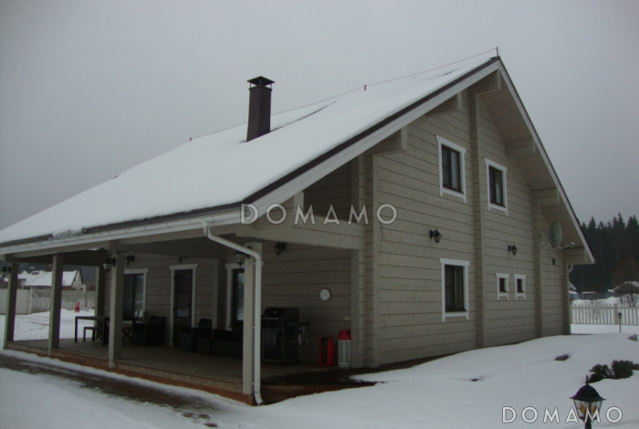 Проект дома из клееного бруса с несложными фасадами