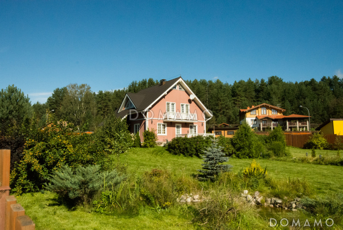 Проект дома из газобетона с большой открытой террасой