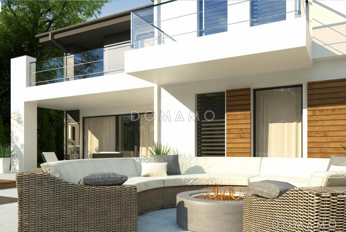 Проект красивого просторного двухэтажного дома из кирпича с террасами, балконами и гаражом