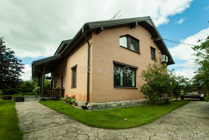 Проект дома из пеноблоков с постирочной на мансардном этаже