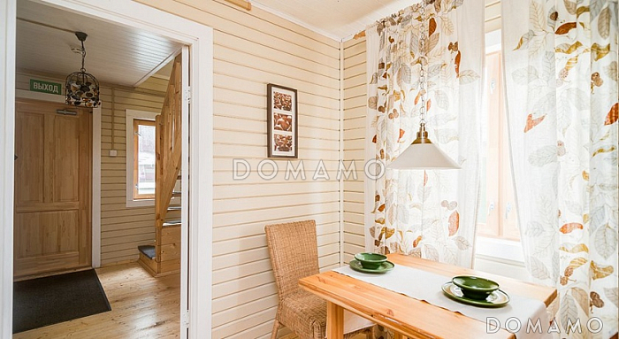 Проект небольшого дома из клееного бруса с мансардной кровлей