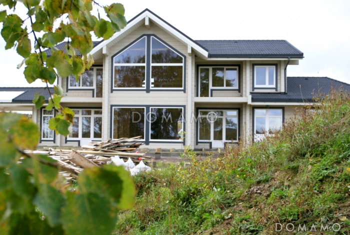 Проект большого деревянного дома из клееного бруса с бильярдной