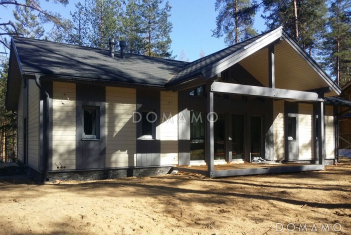 Проект скандинавского дома из кирпича с 2 спальнями, светлой гостиной и крытой террасой