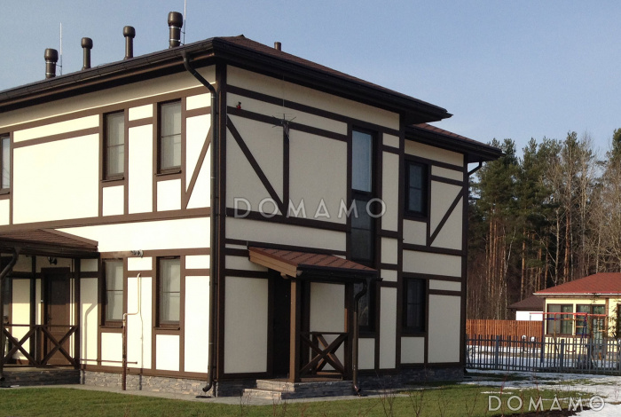 Проект двухэтажного дома из пеноблоков в стиле фахверк