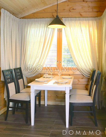 Проект небольшого одноэтажного деревянного дома из клееного бруса с двумя спальнями