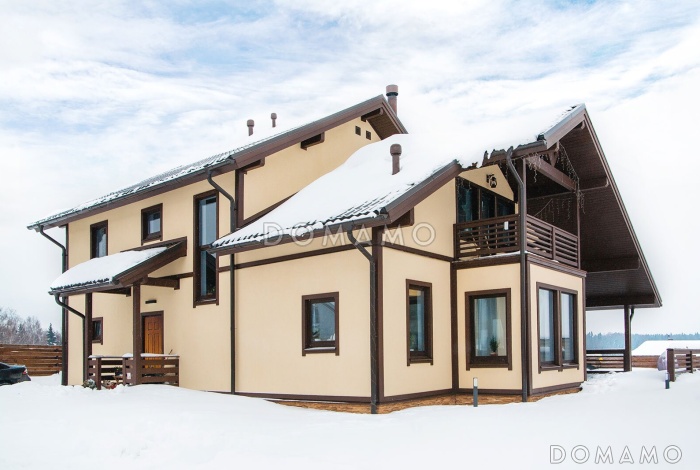 Проект мансардного дома из кирпича с детскими комнатами, уютной гостиной и сауной