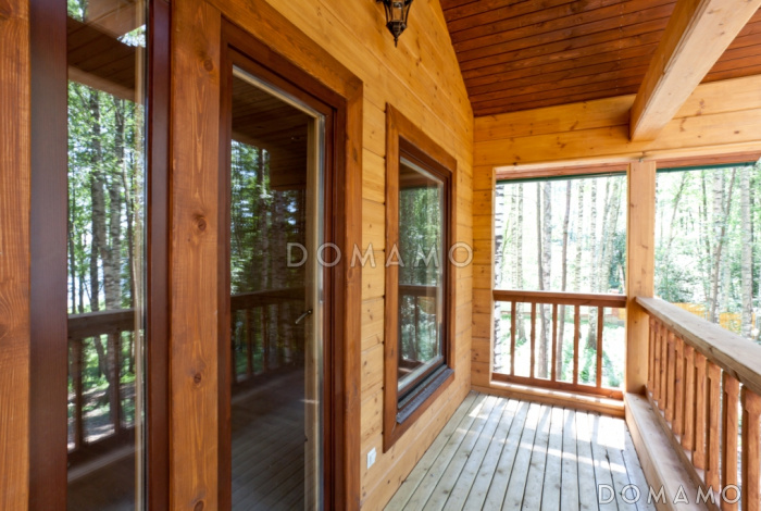 Проект респектабельного дома из клееного бруса с террасой