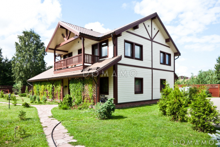 Проект кирпичного дома с просторной кухней и вторым светом